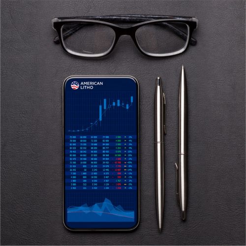 A smart phone with two pens and one a pair of black glasses